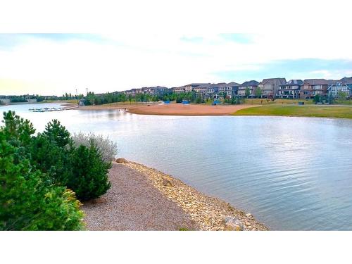 283 Masters Row Se, Calgary, AB - Outdoor With Body Of Water With View