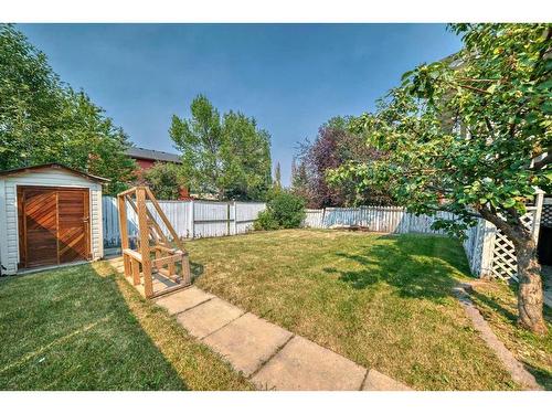 124 Shawinigan Drive Sw, Calgary, AB - Outdoor With Backyard