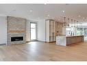 30 Roselawn Crescent Nw, Calgary, AB  - Indoor Photo Showing Living Room With Fireplace 