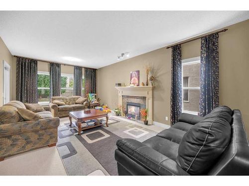 72 Sherwood Way Nw, Calgary, AB - Indoor Photo Showing Living Room With Fireplace