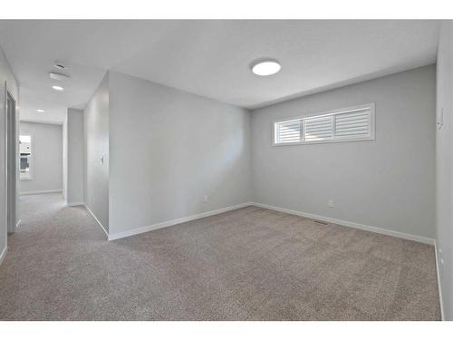 119 Dawson Wharf Rise, Chestermere, AB - Indoor Photo Showing Other Room