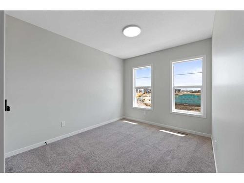 119 Dawson Wharf Rise, Chestermere, AB - Indoor Photo Showing Other Room