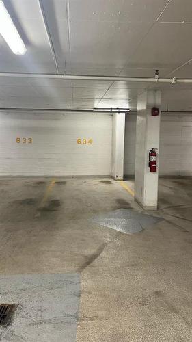 1726-222 Riverfront Avenue Sw, Calgary, AB - Indoor Photo Showing Garage