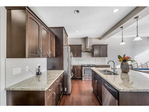 61 Sherwood Heights Nw, Calgary, AB - Indoor Photo Showing Kitchen With Stainless Steel Kitchen With Double Sink With Upgraded Kitchen