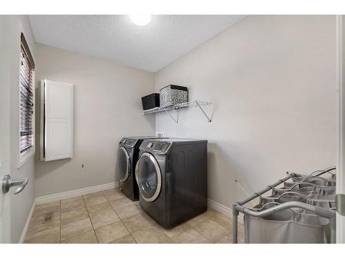 61 Sherwood Heights Nw, Calgary, AB - Indoor Photo Showing Laundry Room