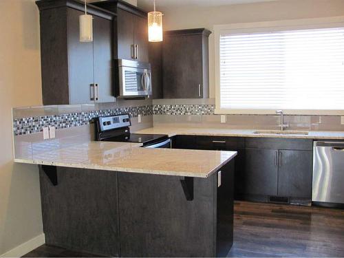 1559 Symons Valley Parkway Nw, Calgary, AB - Indoor Photo Showing Kitchen With Upgraded Kitchen