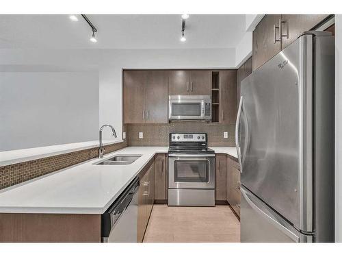 41-25 Auburn Meadows Avenue Se, Calgary, AB - Indoor Photo Showing Kitchen With Double Sink With Upgraded Kitchen