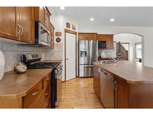 68 Cranfield Gardens Se, Calgary, AB - Indoor Photo Showing Kitchen With Stainless Steel Kitchen With Double Sink