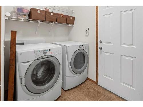 68 Cranfield Gardens Se, Calgary, AB - Indoor Photo Showing Laundry Room