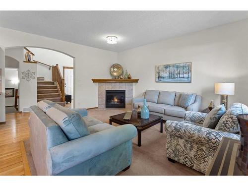 68 Cranfield Gardens Se, Calgary, AB - Indoor Photo Showing Living Room With Fireplace