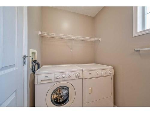 115 Hidden Creek Cove Nw, Calgary, AB - Indoor Photo Showing Laundry Room