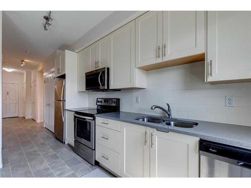 2206-215 Legacy Boulevard Se, Calgary, AB - Indoor Photo Showing Kitchen With Double Sink