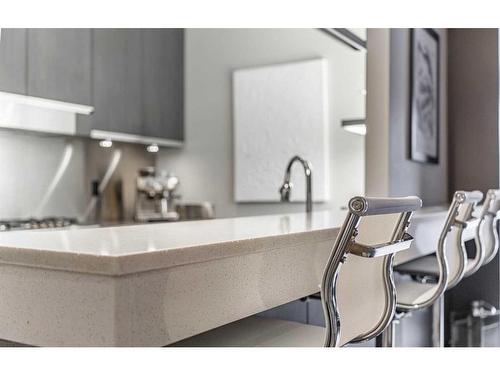 B-1312 Gladstone Road Nw, Calgary, AB - Indoor Photo Showing Kitchen With Stainless Steel Kitchen With Double Sink With Upgraded Kitchen