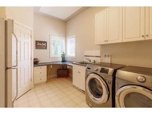 422 Candle Place Sw, Calgary, AB - Indoor Photo Showing Laundry Room