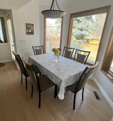 65 Shawnee Crescent Sw, Calgary, AB - Indoor Photo Showing Dining Room