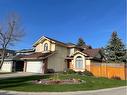 65 Shawnee Crescent Sw, Calgary, AB  - Outdoor With Facade 