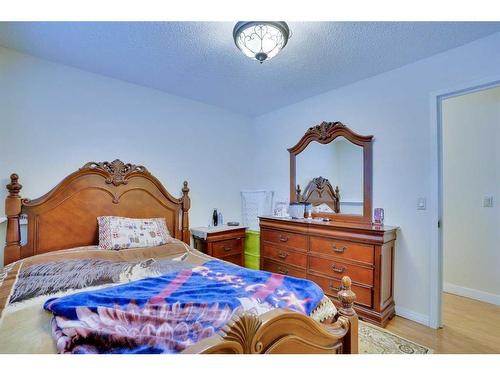 42 Lake Ere Estates, Chestermere, AB - Indoor Photo Showing Bedroom