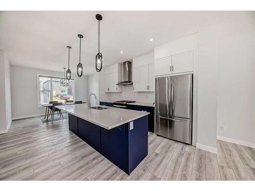 22 Amblehurst Way Nw, Calgary, AB - Indoor Photo Showing Kitchen With Stainless Steel Kitchen With Double Sink With Upgraded Kitchen