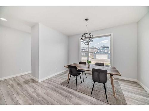 22 Amblehurst Way Nw, Calgary, AB - Indoor Photo Showing Dining Room