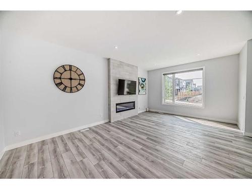 22 Amblehurst Way Nw, Calgary, AB - Indoor Photo Showing Living Room