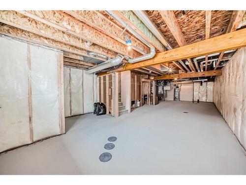 22 Amblehurst Way Nw, Calgary, AB - Indoor Photo Showing Basement