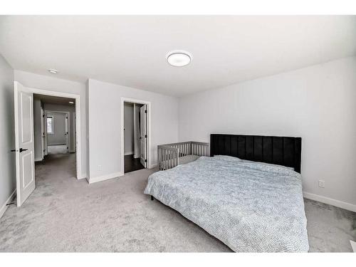 22 Amblehurst Way Nw, Calgary, AB - Indoor Photo Showing Bedroom