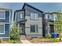 22 Amblehurst Way Nw, Calgary, AB  - Outdoor With Facade 