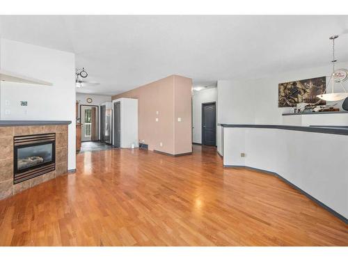 27 Ratcliffe Street, Red Deer, AB - Indoor Photo Showing Living Room With Fireplace