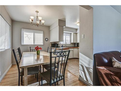 25 Rossmount Road Sw, Calgary, AB - Indoor Photo Showing Dining Room