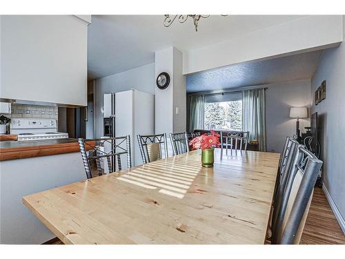 25 Rossmount Road Sw, Calgary, AB - Indoor Photo Showing Dining Room