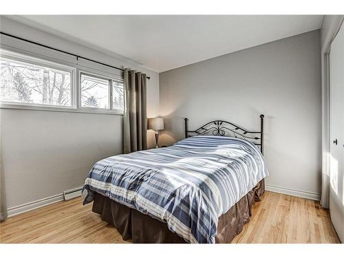 25 Rossmount Road Sw, Calgary, AB - Indoor Photo Showing Bedroom