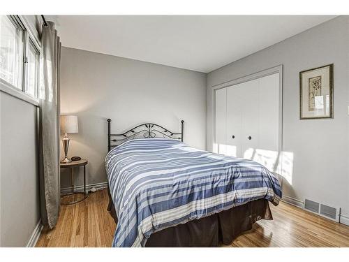 25 Rossmount Road Sw, Calgary, AB - Indoor Photo Showing Bedroom