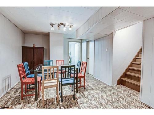 25 Rossmount Road Sw, Calgary, AB - Indoor Photo Showing Dining Room