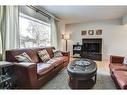 25 Rossmount Road Sw, Calgary, AB  - Indoor Photo Showing Living Room 