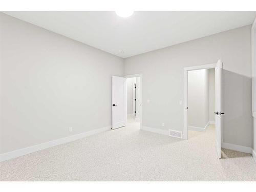 25 Stillwater Bay, Heritage Pointe, AB - Indoor Photo Showing Other Room