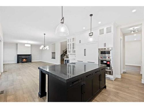 25 Stillwater Bay, Heritage Pointe, AB - Indoor Photo Showing Kitchen With Upgraded Kitchen