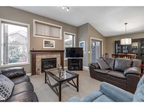 1026 Williamstown Boulevard Nw, Airdrie, AB - Indoor Photo Showing Living Room With Fireplace