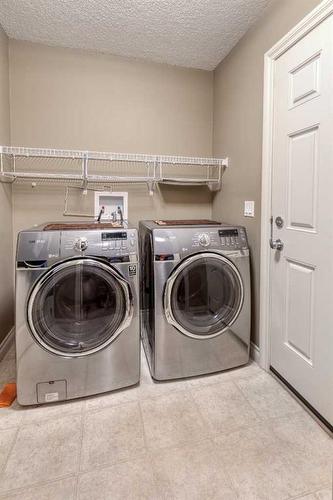 1026 Williamstown Boulevard Nw, Airdrie, AB - Indoor Photo Showing Laundry Room