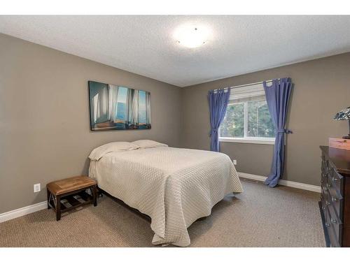 1026 Williamstown Boulevard Nw, Airdrie, AB - Indoor Photo Showing Bedroom