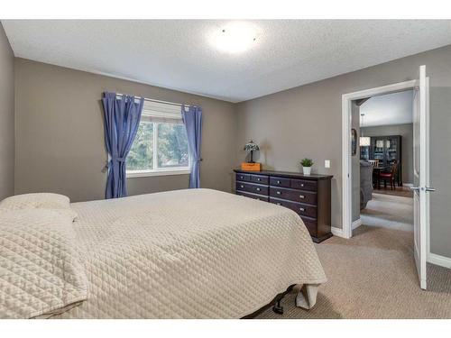 1026 Williamstown Boulevard Nw, Airdrie, AB - Indoor Photo Showing Bedroom