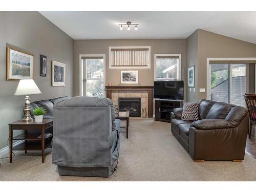 1026 Williamstown Boulevard Nw, Airdrie, AB - Indoor Photo Showing Living Room With Fireplace