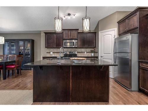 1026 Williamstown Boulevard Nw, Airdrie, AB - Indoor Photo Showing Kitchen With Stainless Steel Kitchen With Upgraded Kitchen