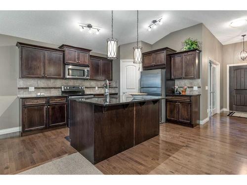 1026 Williamstown Boulevard Nw, Airdrie, AB - Indoor Photo Showing Kitchen With Upgraded Kitchen