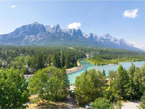 905 Bridge Road, Canmore, AB - Outdoor With Body Of Water With View