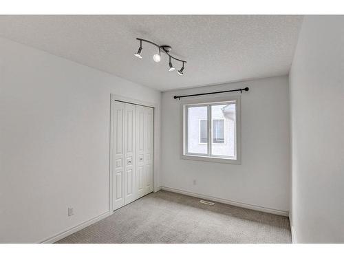 133 Evergreen Plaza Sw, Calgary, AB - Indoor Photo Showing Other Room