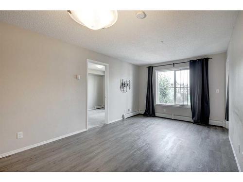 1335-81 Legacy Boulevard Se, Calgary, AB - Indoor Photo Showing Other Room