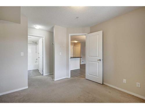 1335-81 Legacy Boulevard Se, Calgary, AB - Indoor Photo Showing Other Room