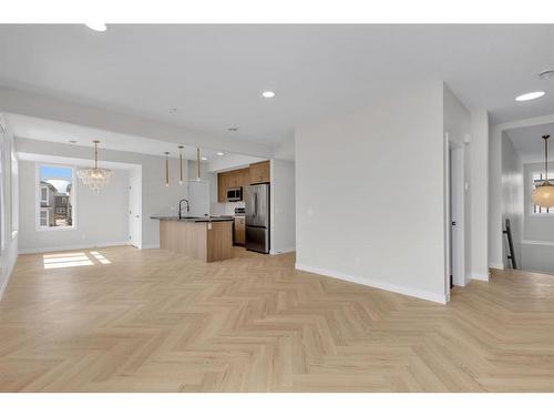 103-562 Seton Circle Se, Calgary, AB - Indoor Photo Showing Kitchen