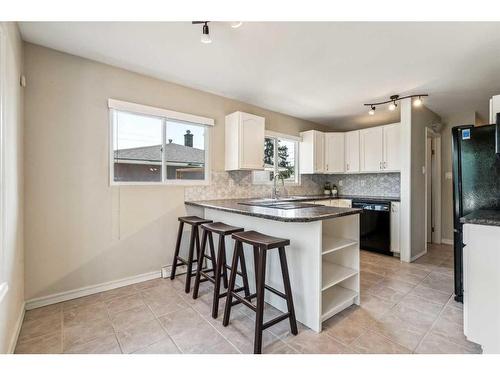 8247 4A Street Sw, Calgary, AB - Indoor Photo Showing Kitchen