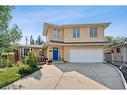 8247 4A Street Sw, Calgary, AB  - Outdoor With Facade 